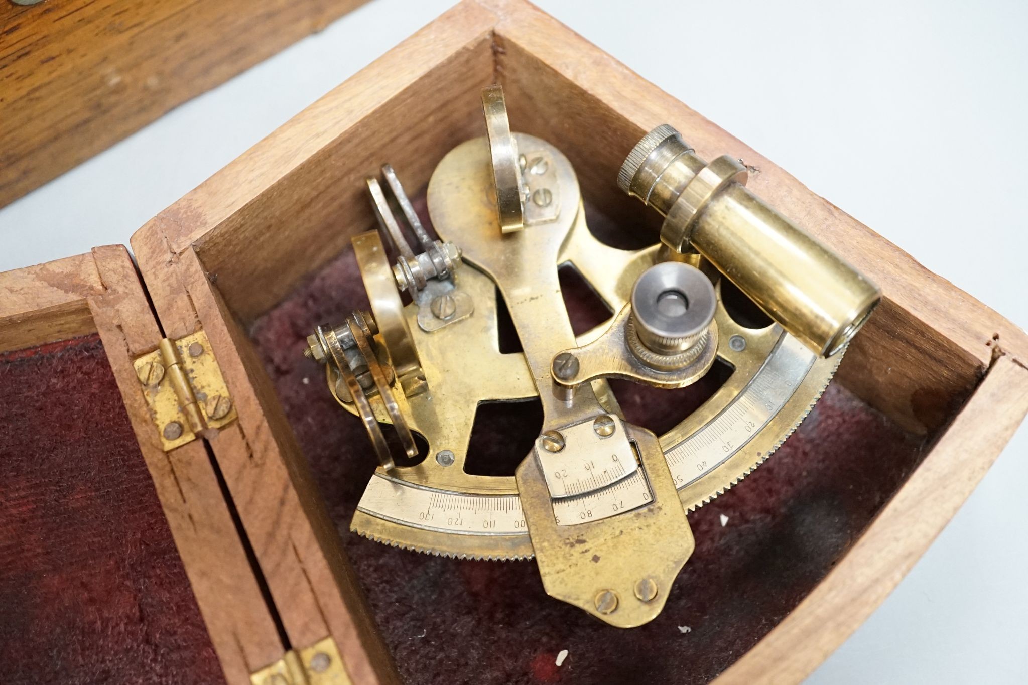 A writing slope, box and miniature Stanley sextant